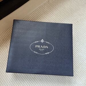 Prada box with studs and tissue paper